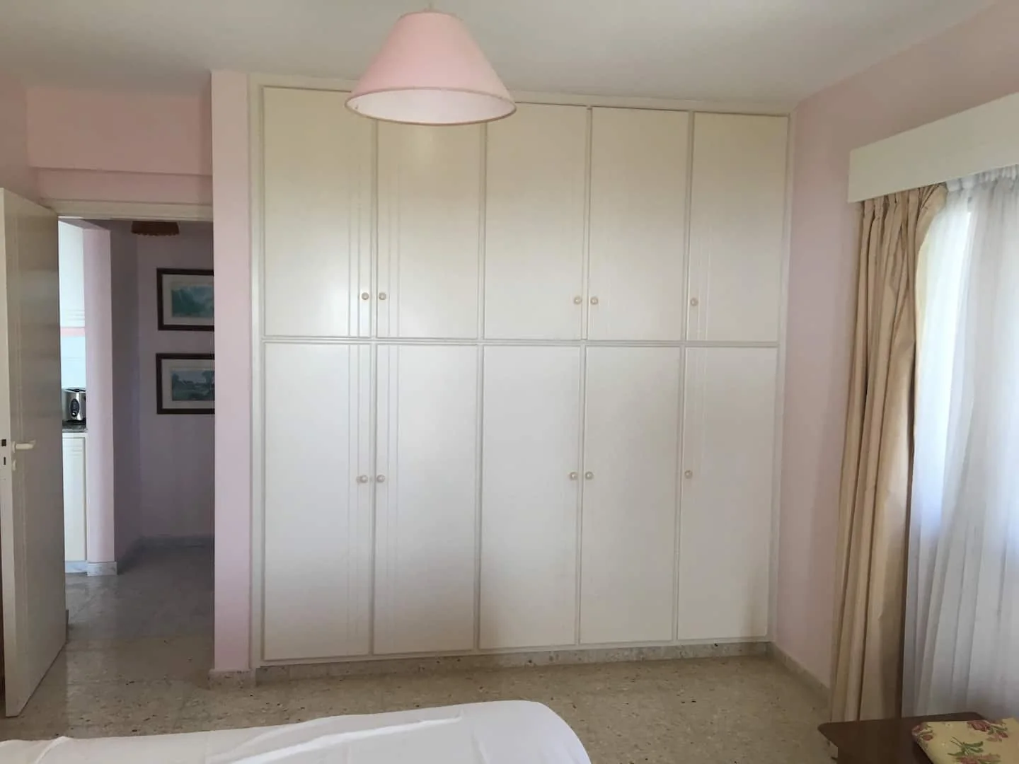 Fitted wardrobes in the representative apartment bedroom