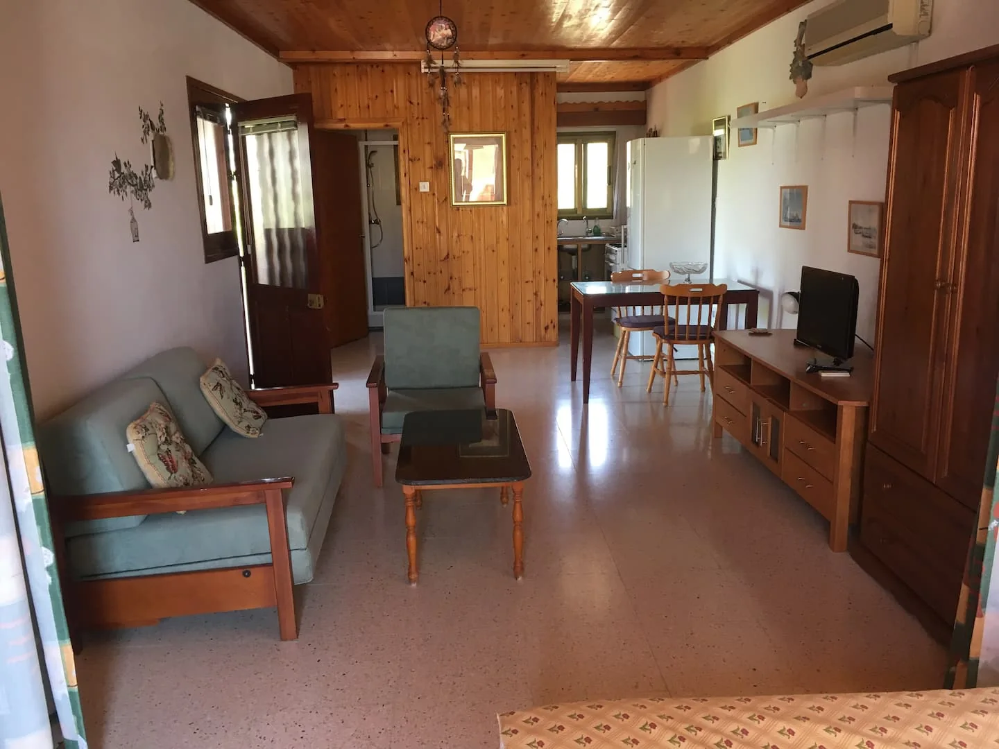 The studio living and dining area, looking towards the kitchen
